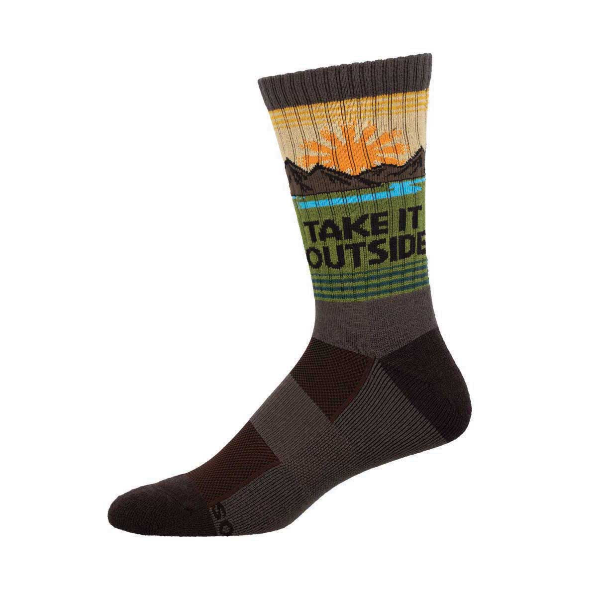 A pair of Merino wool socks with a mountain and sunset design, featuring text that reads 'TAKE IT OUTSIDE'.