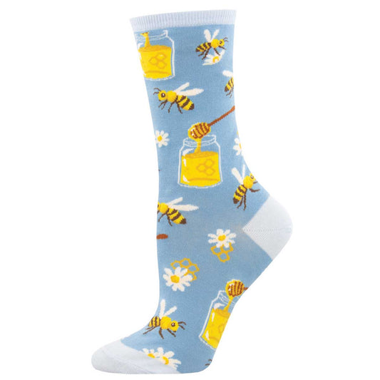 Socks with bee and honey design on a light blue background