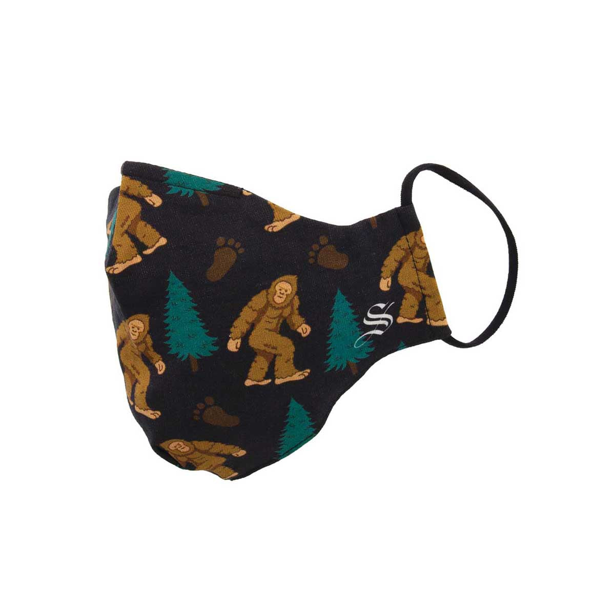 A fabric face mask with a pattern featuring illustrations of Bigfoot in various forest settings.