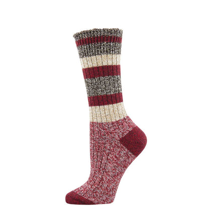 A pair of striped socks with a recycled blend composition, featuring various colors including shaded of red, cream, and brown.