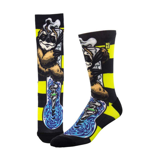 A pair of socks featuring a 3D printed design with a sloth and a bong in black, yellow, and blue colors.