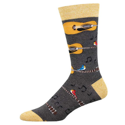 A pair of colorful bamboo socks with guitars and birds singing, predominantly gray with yellow tips and a decorative pattern.
