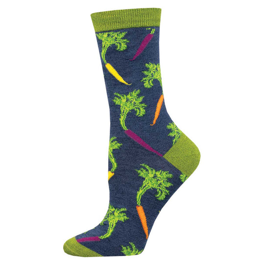 A colorful crew sock with a pattern of green vegetables, including carrots, on a dark background with a green heel and toe.