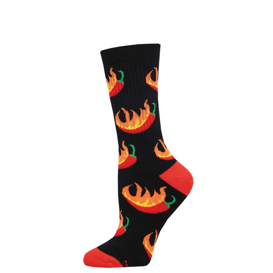 A pair of black crew socks with a pattern of stylized red chili peppers and fire.
