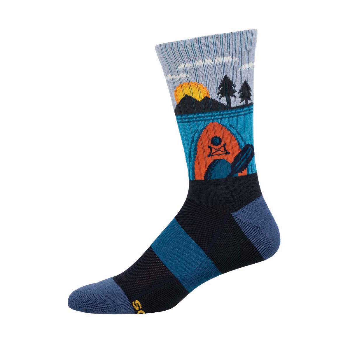 A pair of merino wool socks with a graphic design featuring a sunrise, kayak, and trees on the cuff.